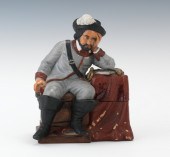 A Seated Full Figural Humidor