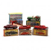A SELECTION OF FIVE TIN TOYS,