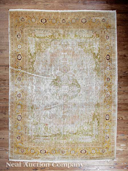 A Semi-Antique Kirman Silk Rug