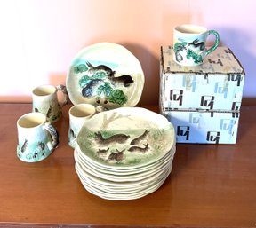 A set of 8 mugs 3.5"H, with two