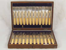 A set of a dozen pairs of silver