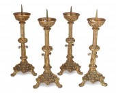 A SET OF BRONZE PRICKET CANDLE