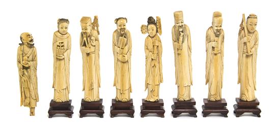 *A Set of Eight Carved Ivory