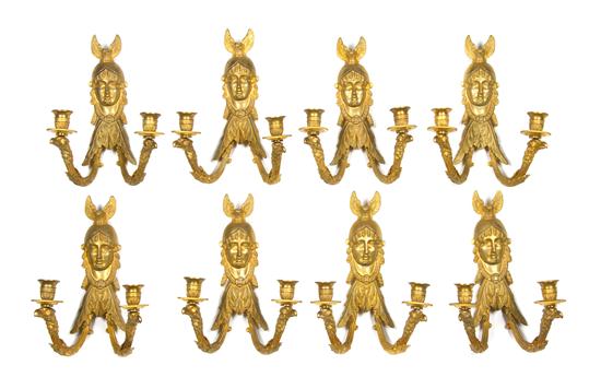 A Set of Eight Empire Style Gilt