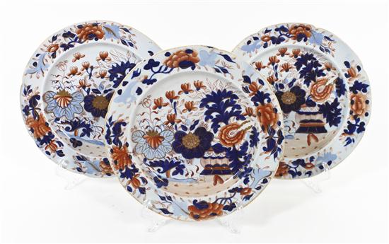A Set of Eight Imari Style Plates