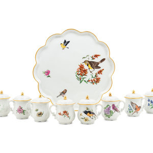 A Set of Eight Limoges Porcelain
