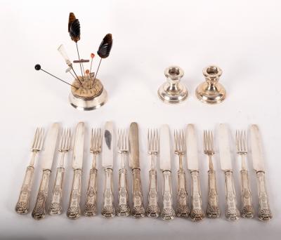 A set of eight silver dessert