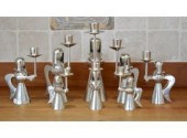 A set of eight tin angel form