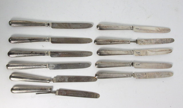 A set of eleven silver dessert