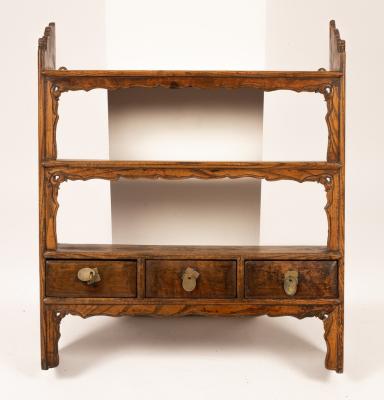 A set of elm hanging shelves fitted