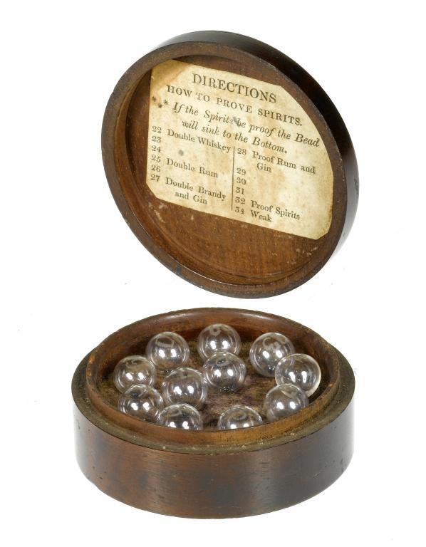 A SET OF ENGLISH GLASS SPIRIT BEADS