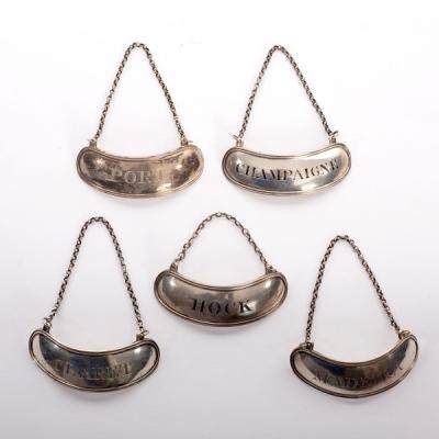 A set of five Irish silver decanter