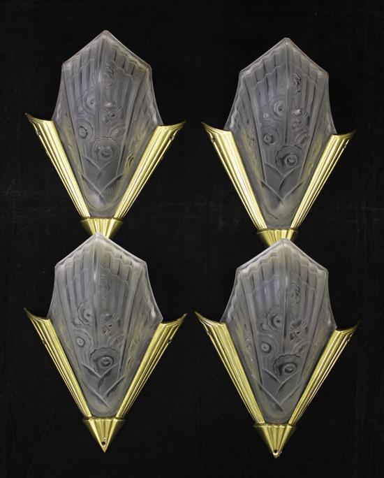 A set of four Art Deco moulded