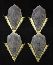 A set of four Art Deco moulded