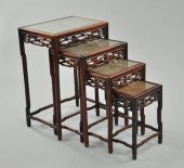 A Set of Four Carved Chinese N