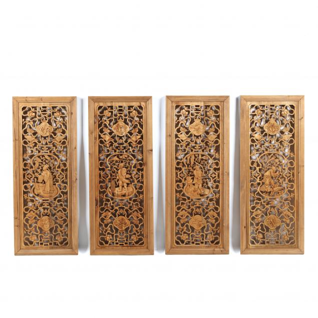 A SET OF FOUR CHINESE CARVED WOODEN
