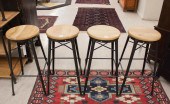 A SET OF FOUR COBB BAR STOOLSA