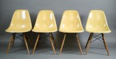 A SET OF FOUR EAMES DSW CHAIRS