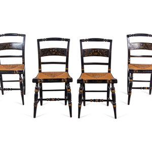 A Set of Four Ebonized and