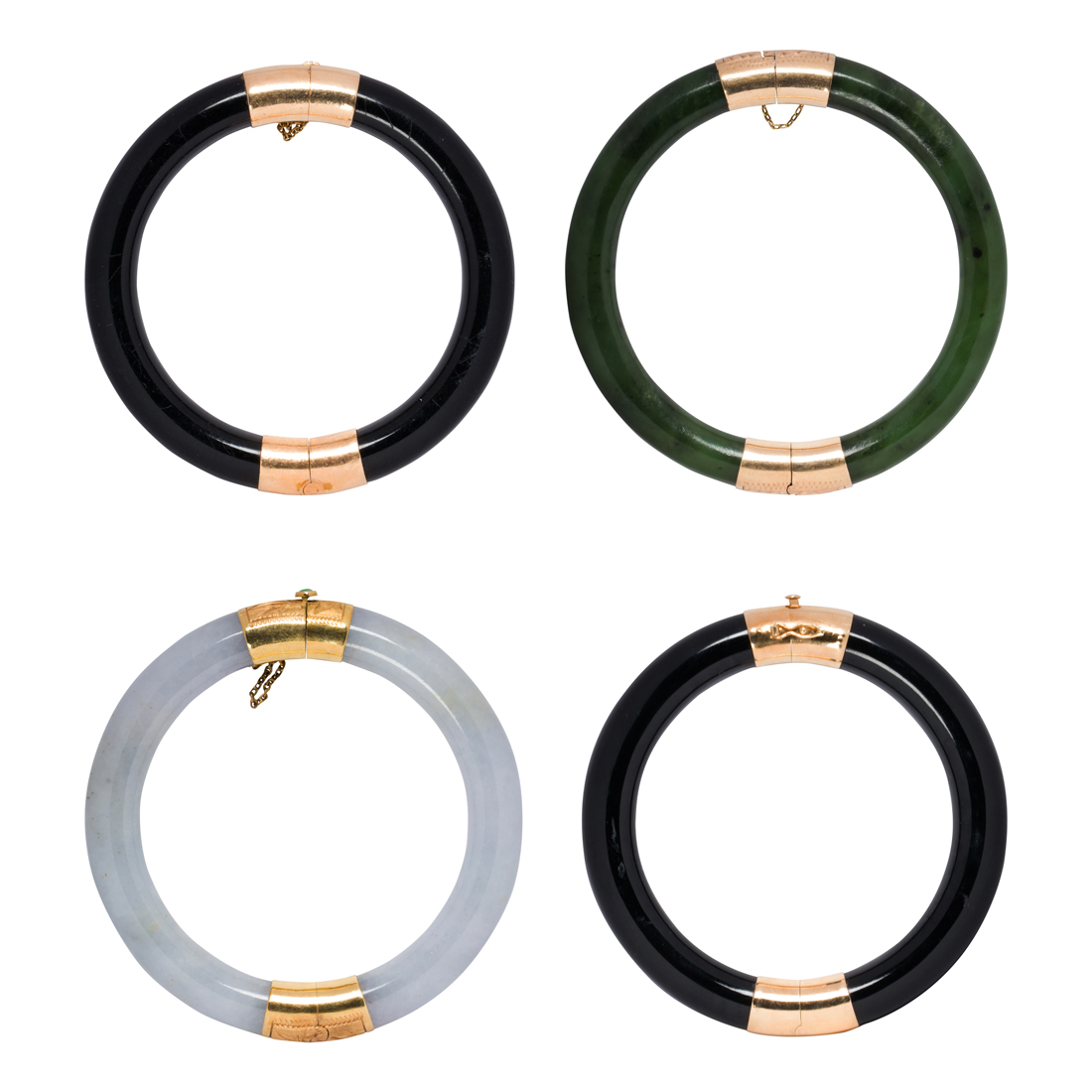 A SET OF FOUR JADE AND 14K GOLD