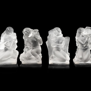 A Set of Four Lalique Surtout