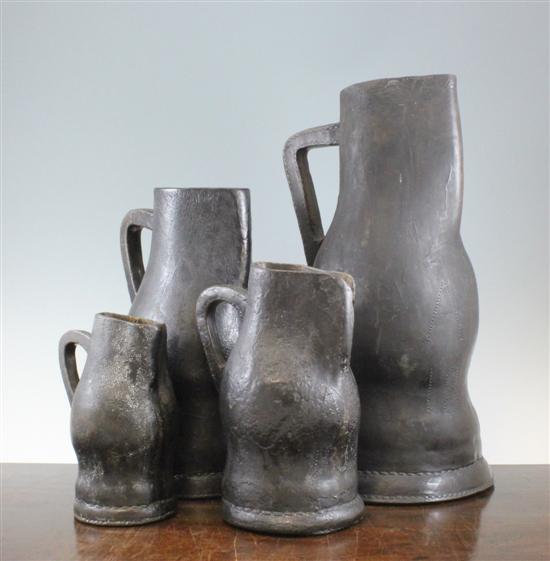 A set of four leather blackjacks