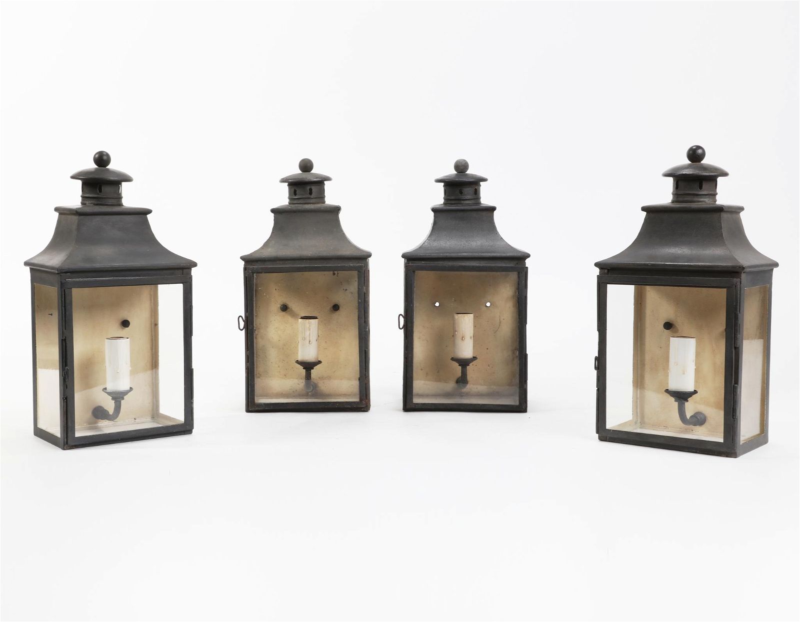 A SET OF FOUR PAUL FERRANTE LANTERN