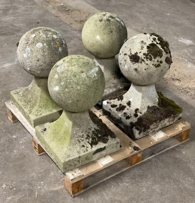 A set of four reconstituted stone