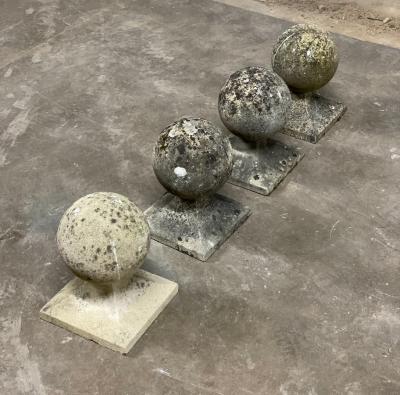 A set of four reconstituted stone