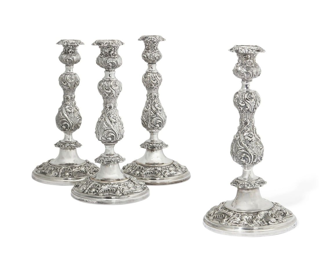 A SET OF FOUR ROCOCO STYLE SILVER