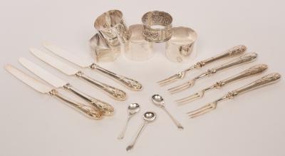 A set of four silver handled