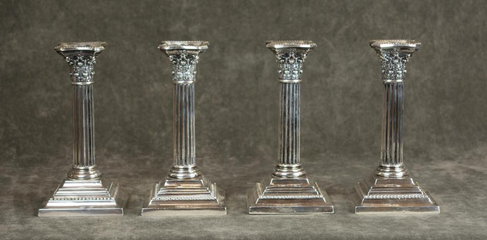 A SET OF FOUR SILVER CORINTHIAN