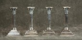 A SET OF FOUR SILVER CORINTHIA