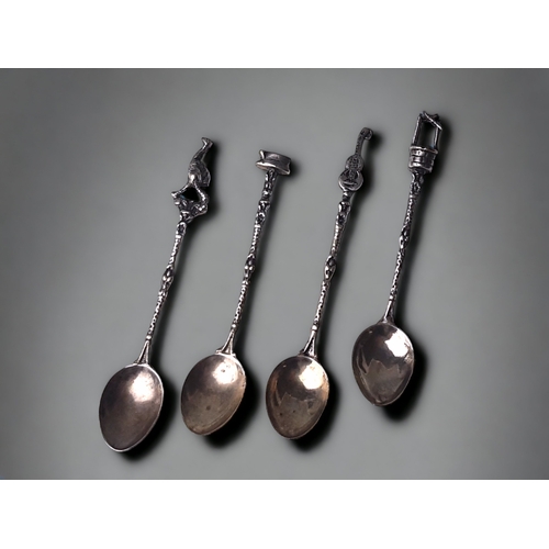 A SET OF FOUR STERLING SILVER