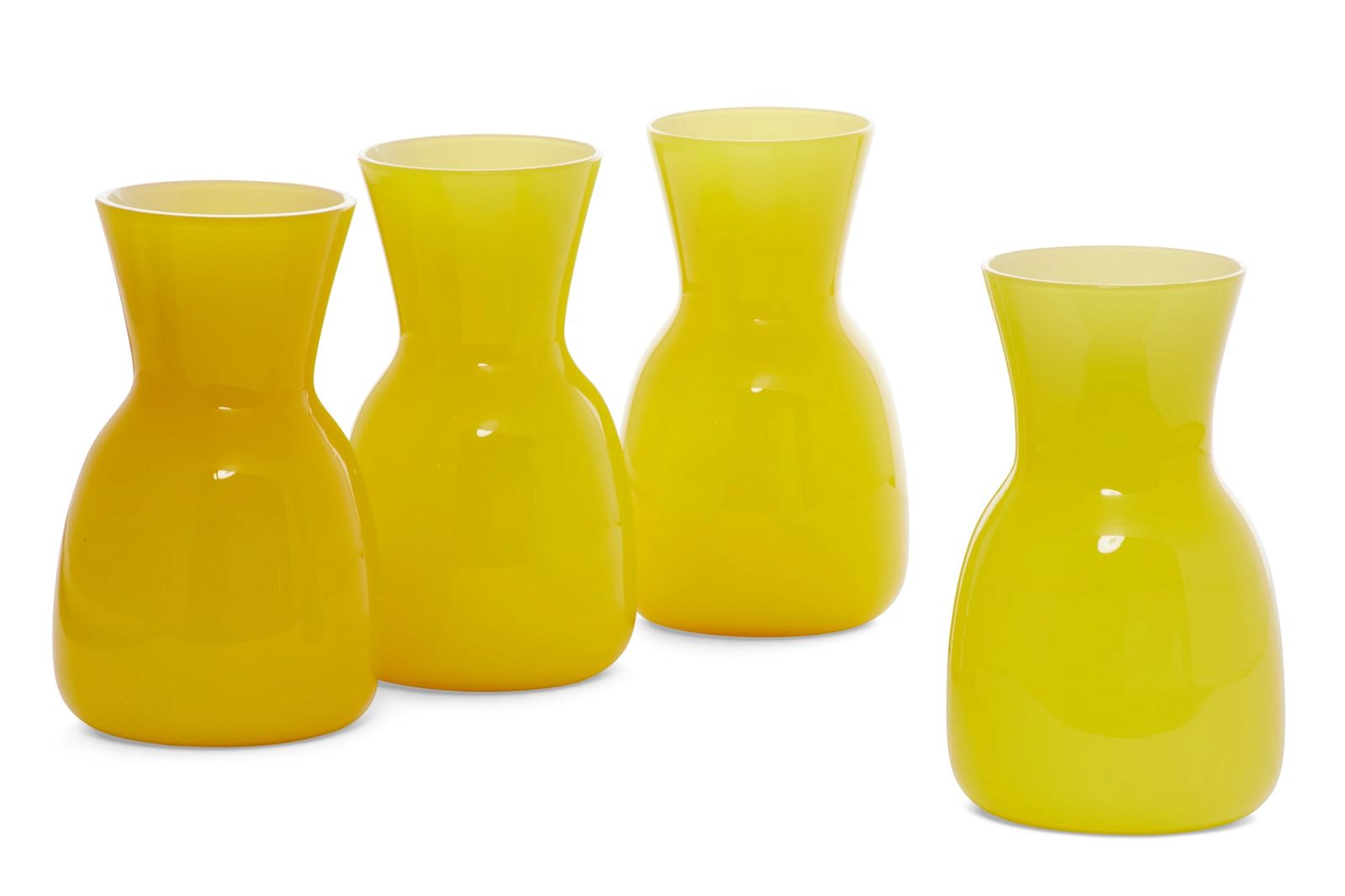 A SET OF FOUR VENINI YELLOW GLASS