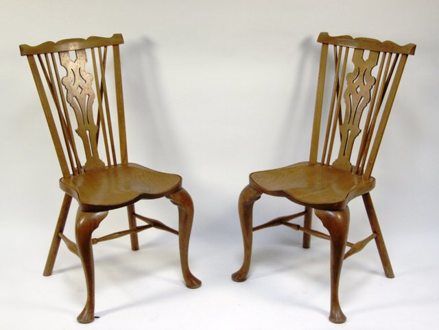 A set of four Windsor type dining