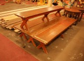 A SET OF FOUR WOOD BENCHESA SE