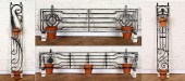 A SET OF FOUR WROUGHT IRON WAL