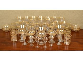 A set of gilt and etched crystal