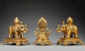 A SET OF GILT-BRONZE 'PEACEFUL