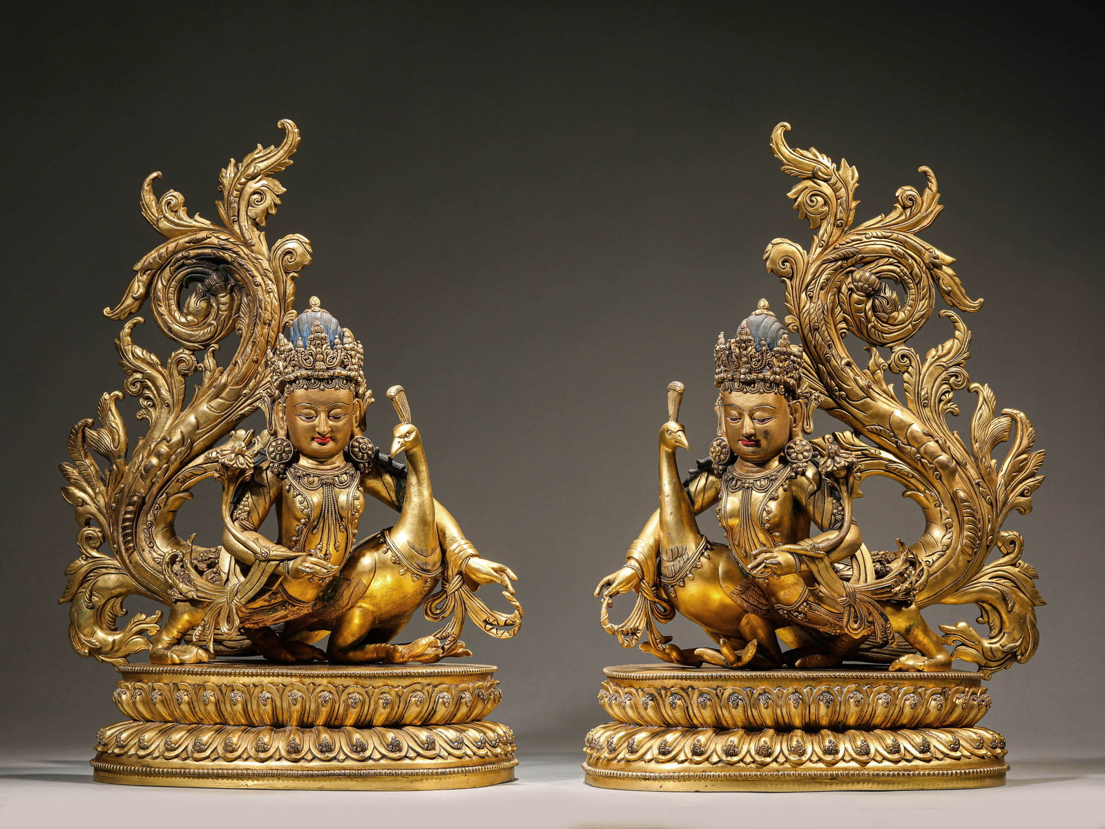 A SET OF GILT-BRONZE 'PEACOCK' KING