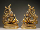 A SET OF GILT-BRONZE 'PEACOCK'