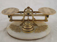 A set of gilt metal postal scales