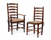 A SET OF LADDER BACK CHAIRSA s