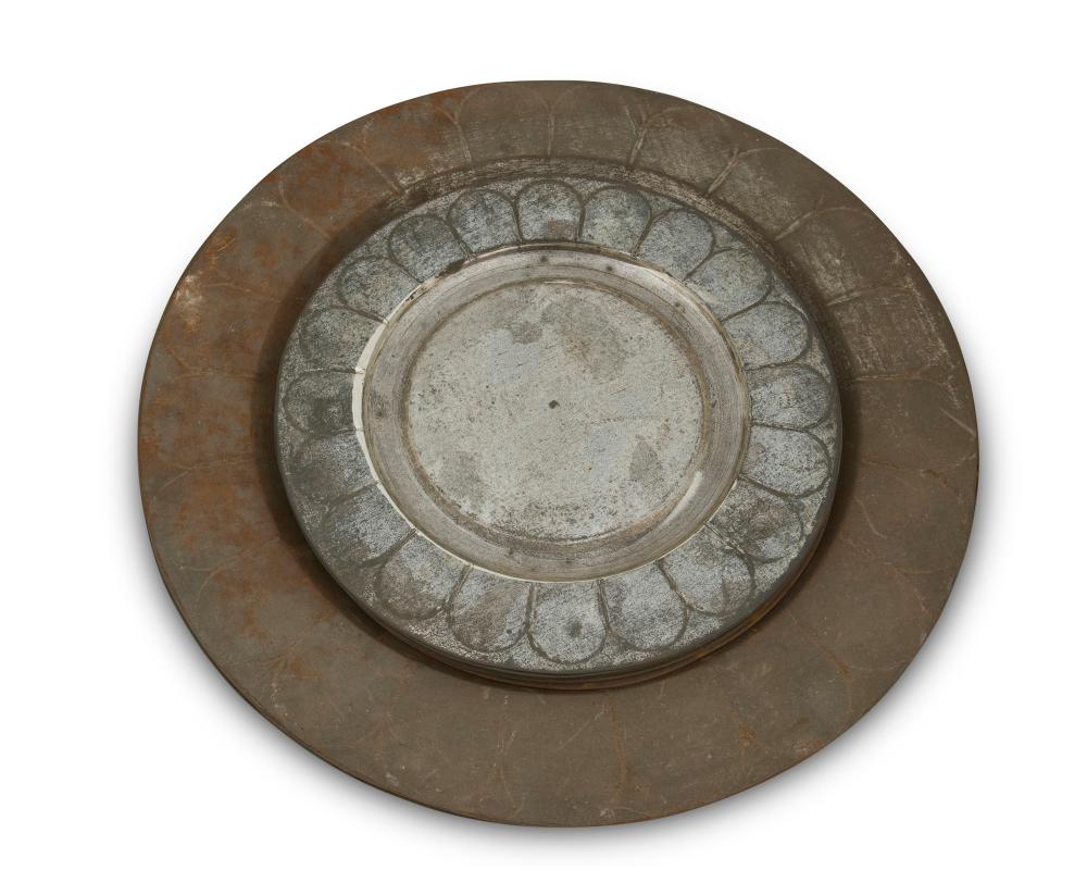 A SET OF MEXICAN TIN PLATESA set of