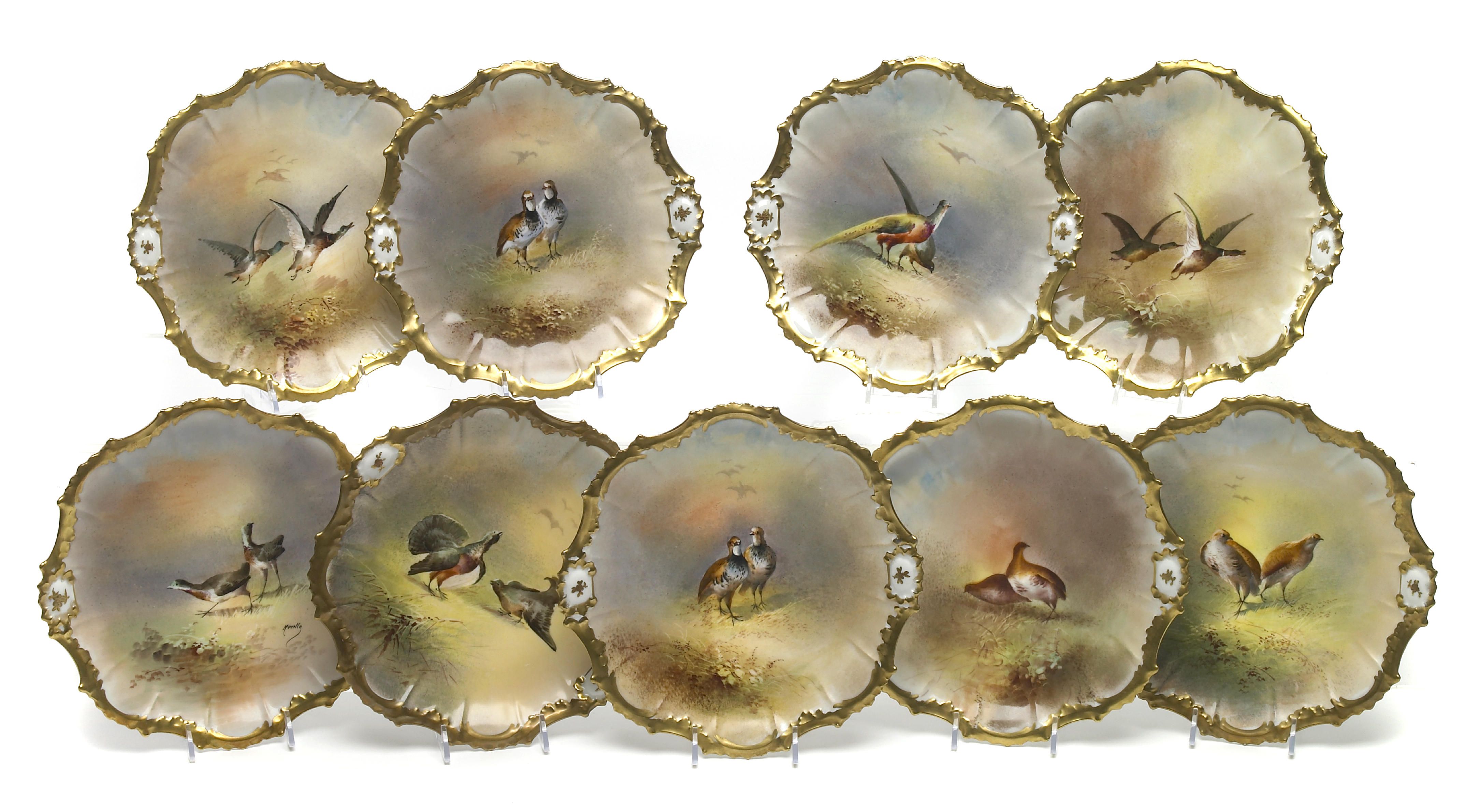 A set of nine Limoges porcelain