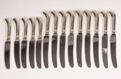 A set of nine silver handled
