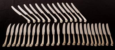 A set of plated pistol grip knives,