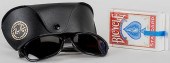 A SET OF RAY-BAN GLASSES AND M