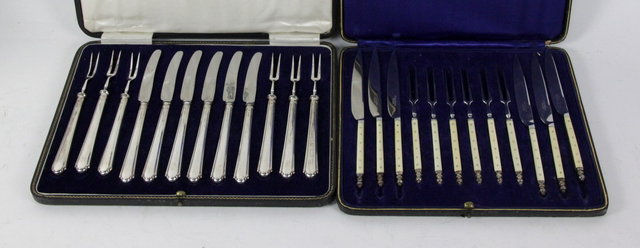 A set of silver handled fruit